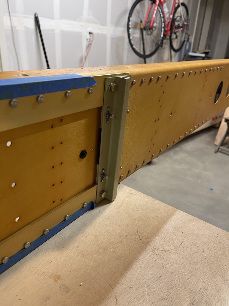 Primed tiedown assembly on wing spar of RV-7A