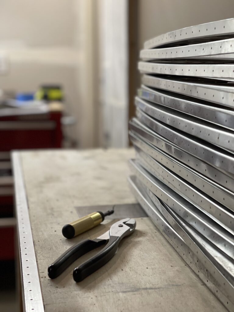 Stack of aluminum wing ribs.