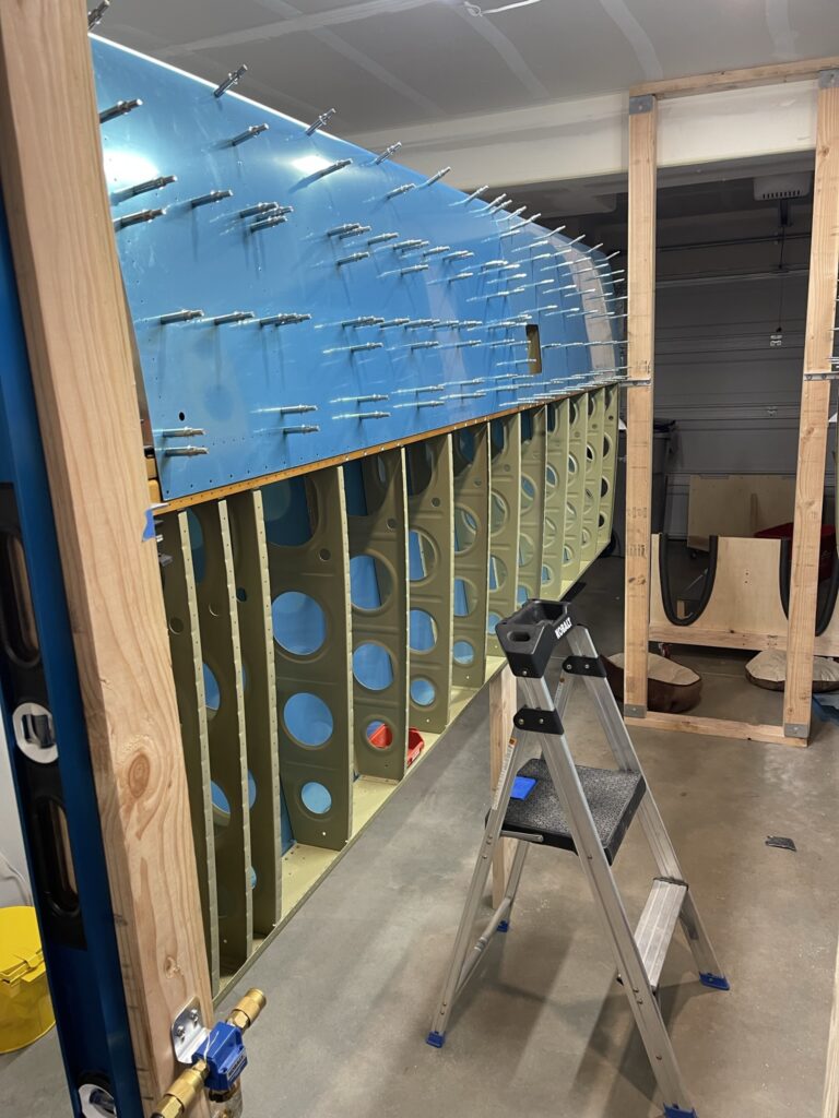 airplane wing being built in garage