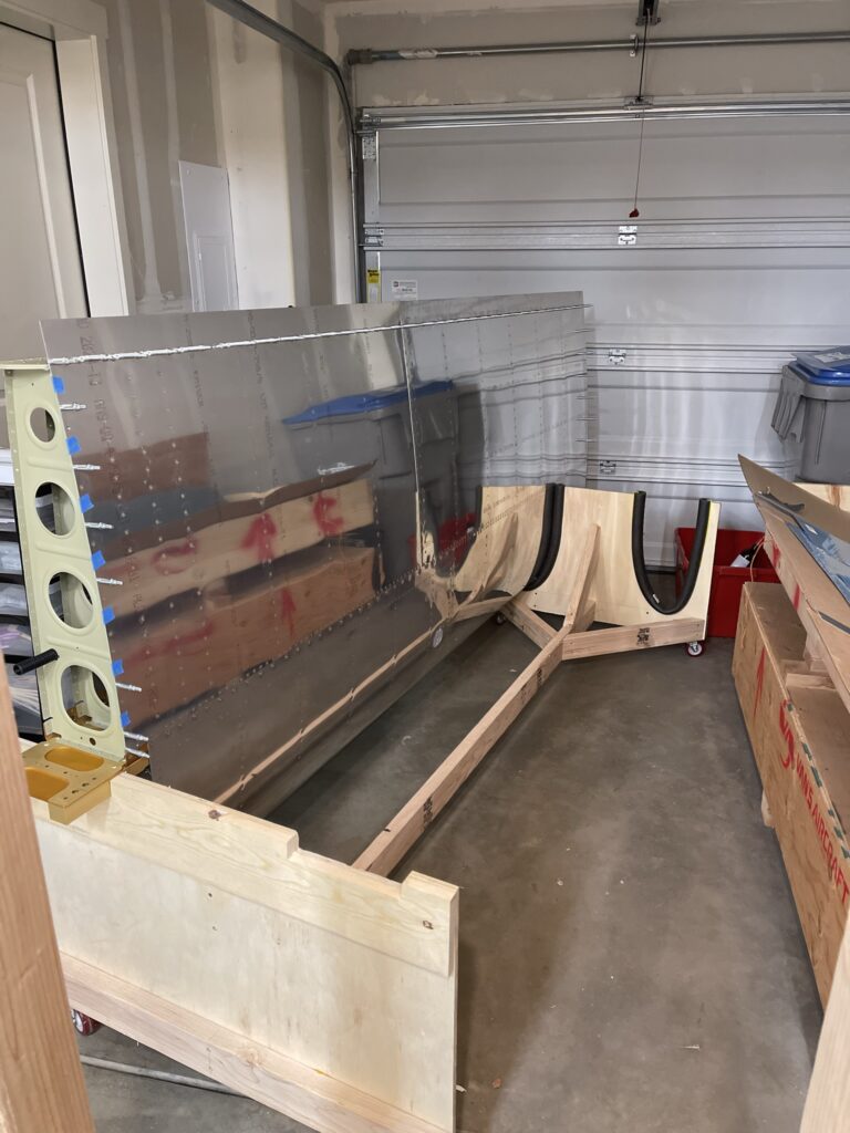 Wing in wheeled cradle